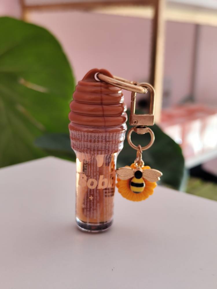 Gloss com chaveiro 🌻 🍯